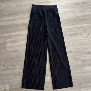 COS  Pleated Trousers